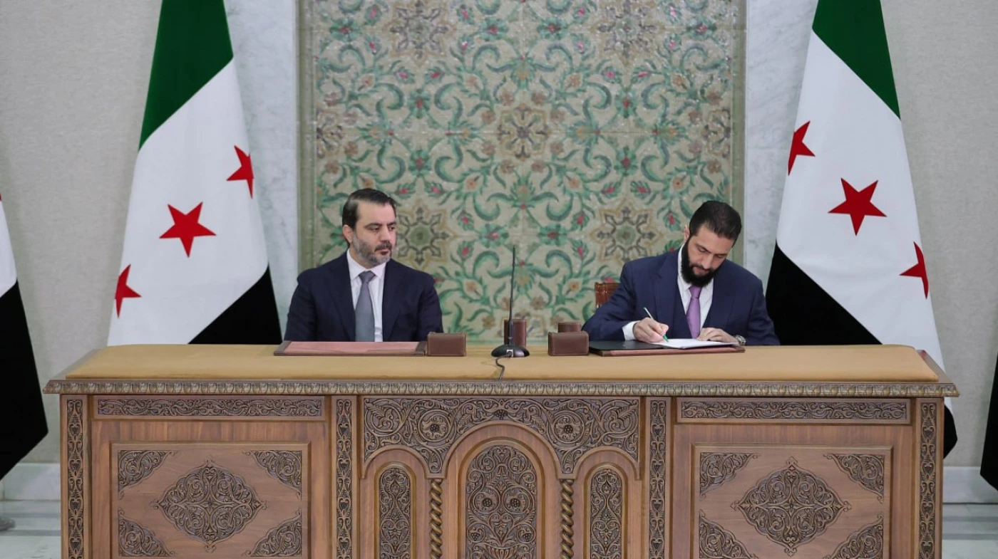 Image of Sharaa signs new Syrian Constitutional Declaration