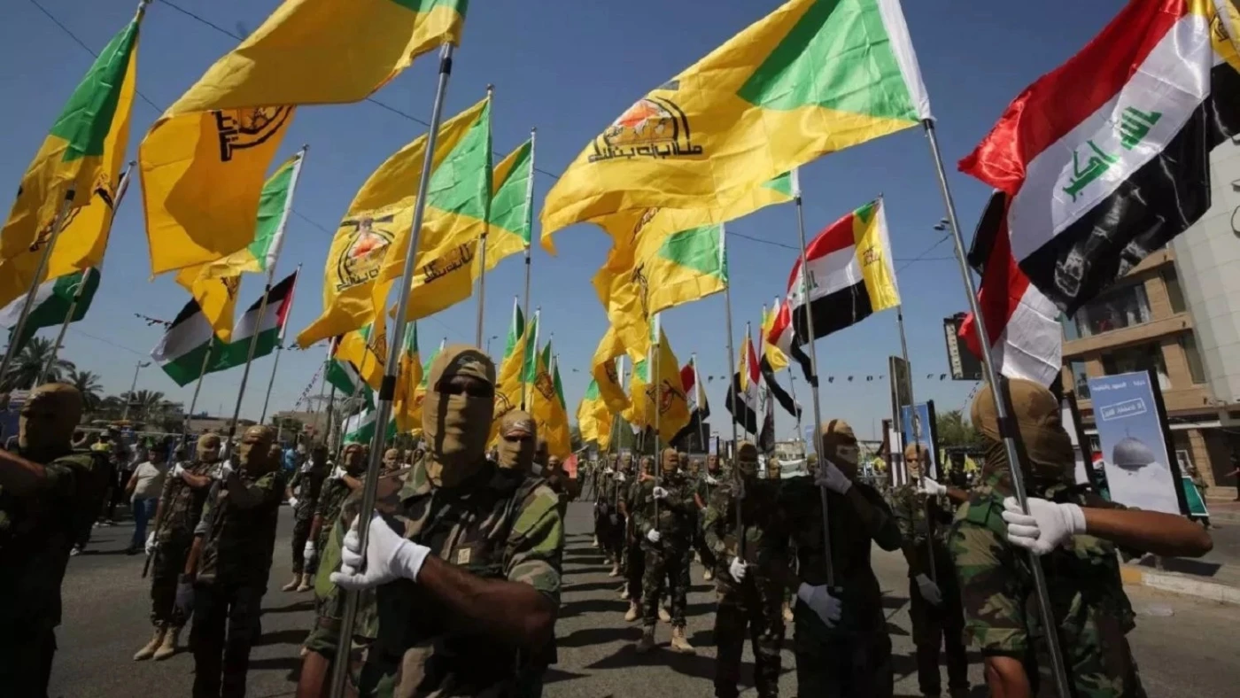 Image of Iran-backed resistance vows retaliation if Iraq is pulled into regional war