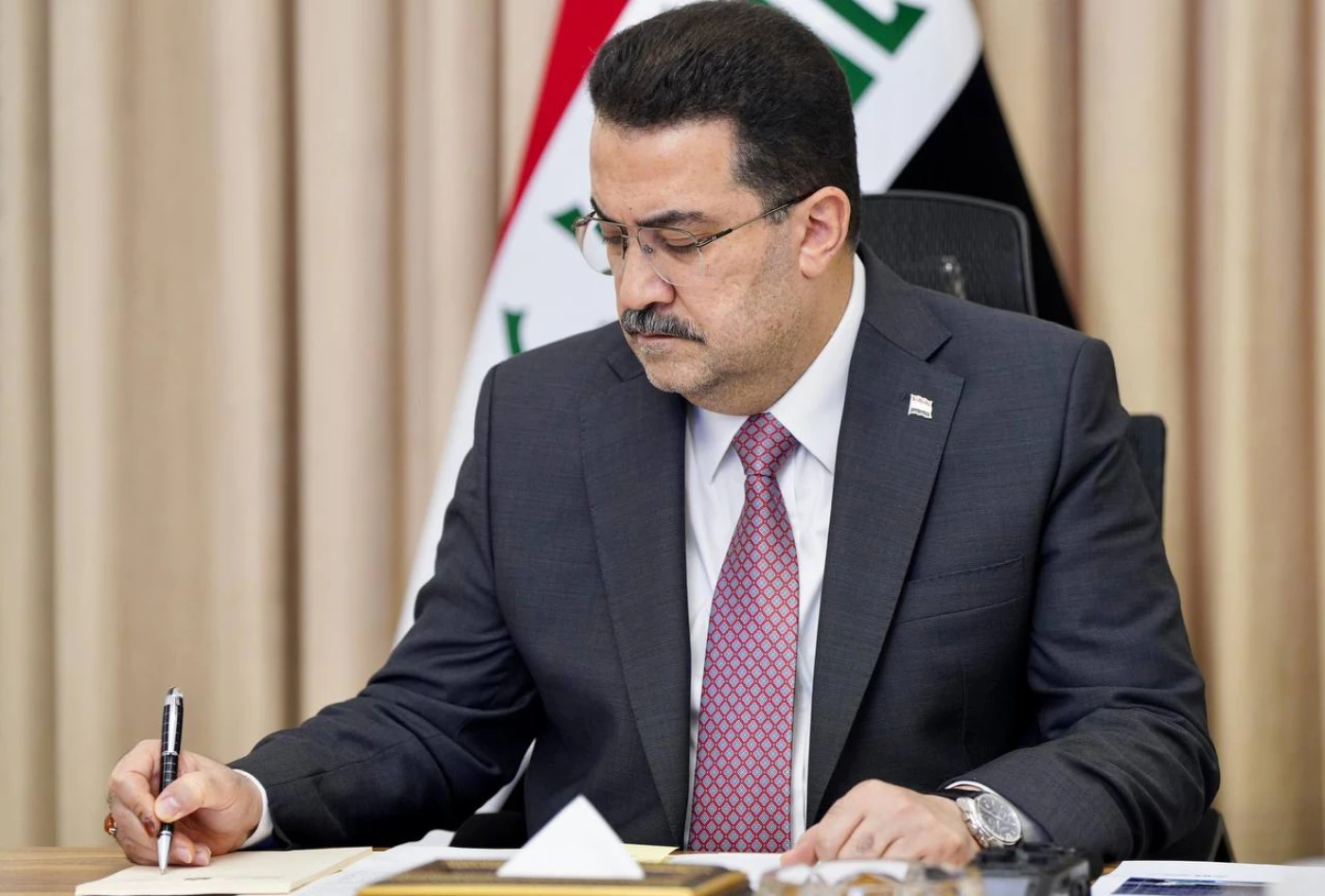 Image of Iraqi PM to meet King of Britain, sign MoUs with British companies